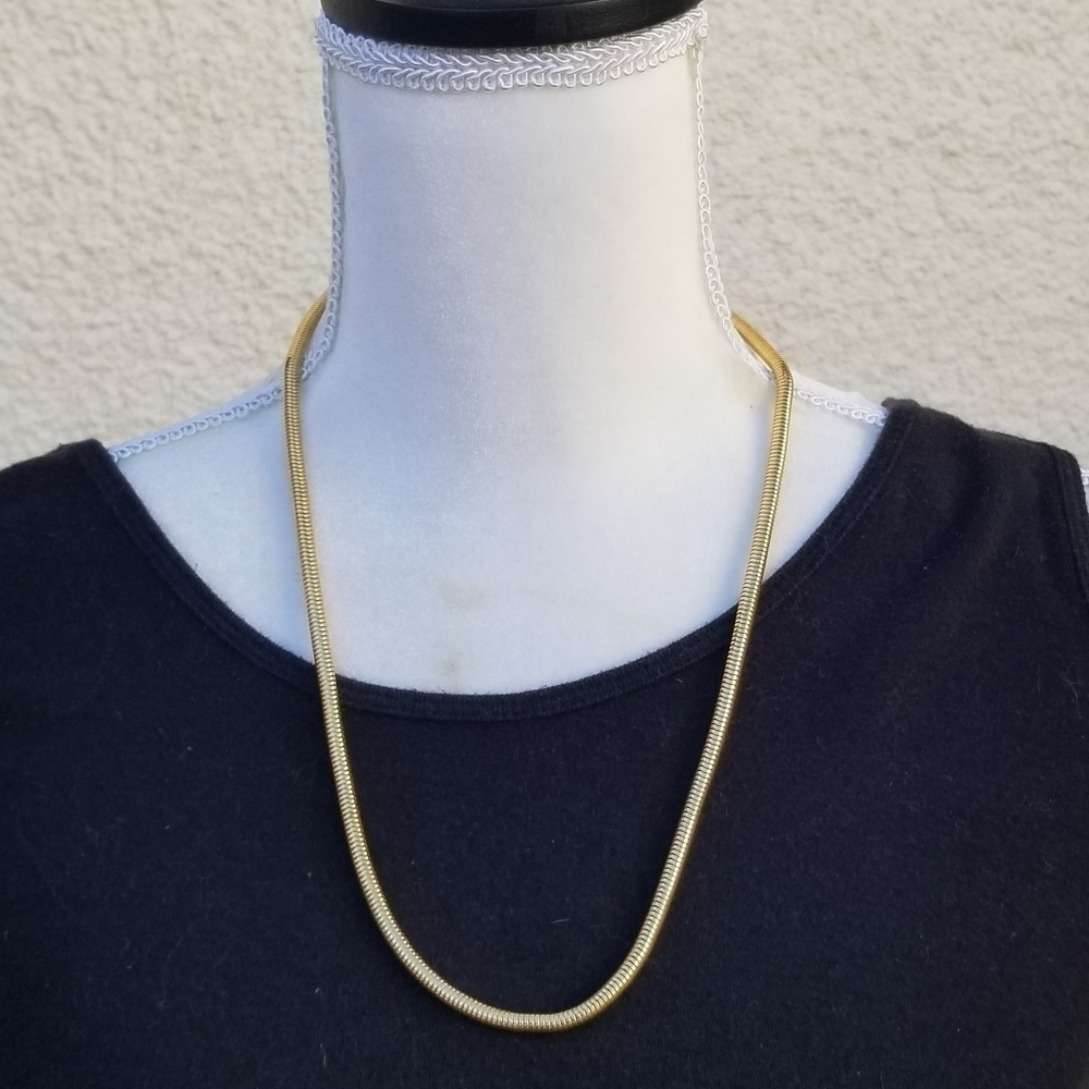 long gold tone tube liquid metal chain necklace